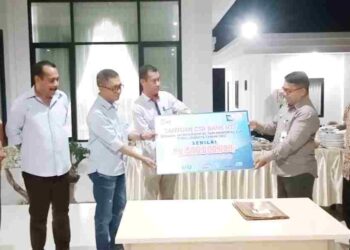 Pj Bupati, Marsianus Jawa Sambut Kepala Bank NTT Cabang Lewoleba Serahkan Dana CSR Liga III ETMC Edisi XXXI Secara Simbolis